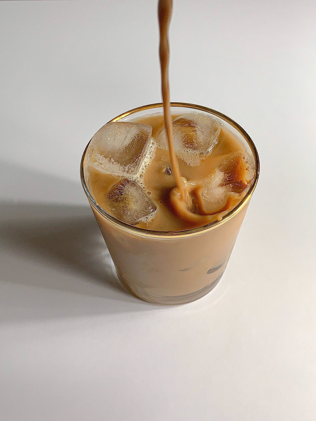 Pouring coffee into a cup